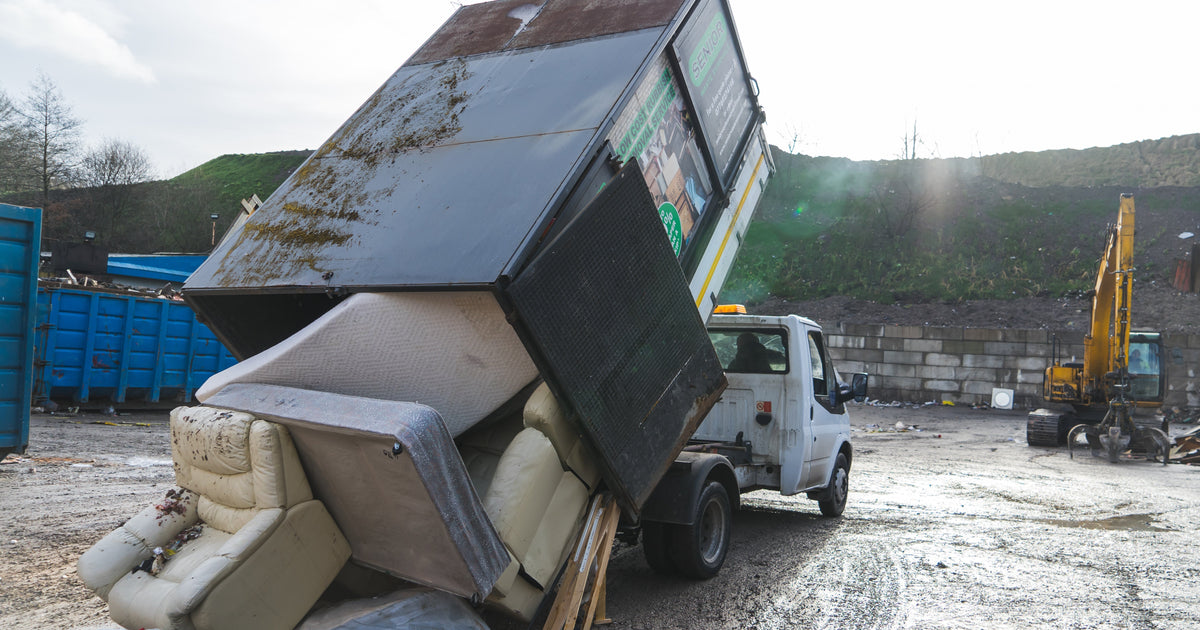 Senior Waste Removals crew carefully carrying out a hoarding clearance in Lancashire