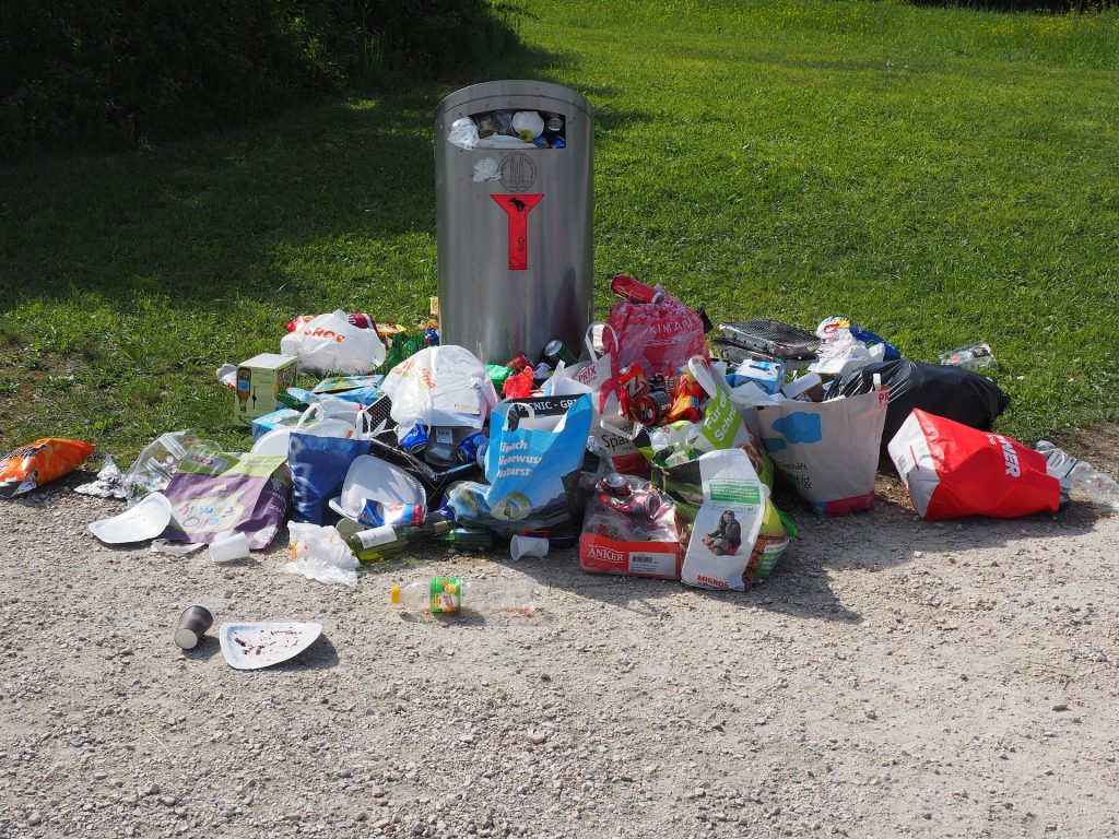 A pile of rubbish sitting on the side of a road